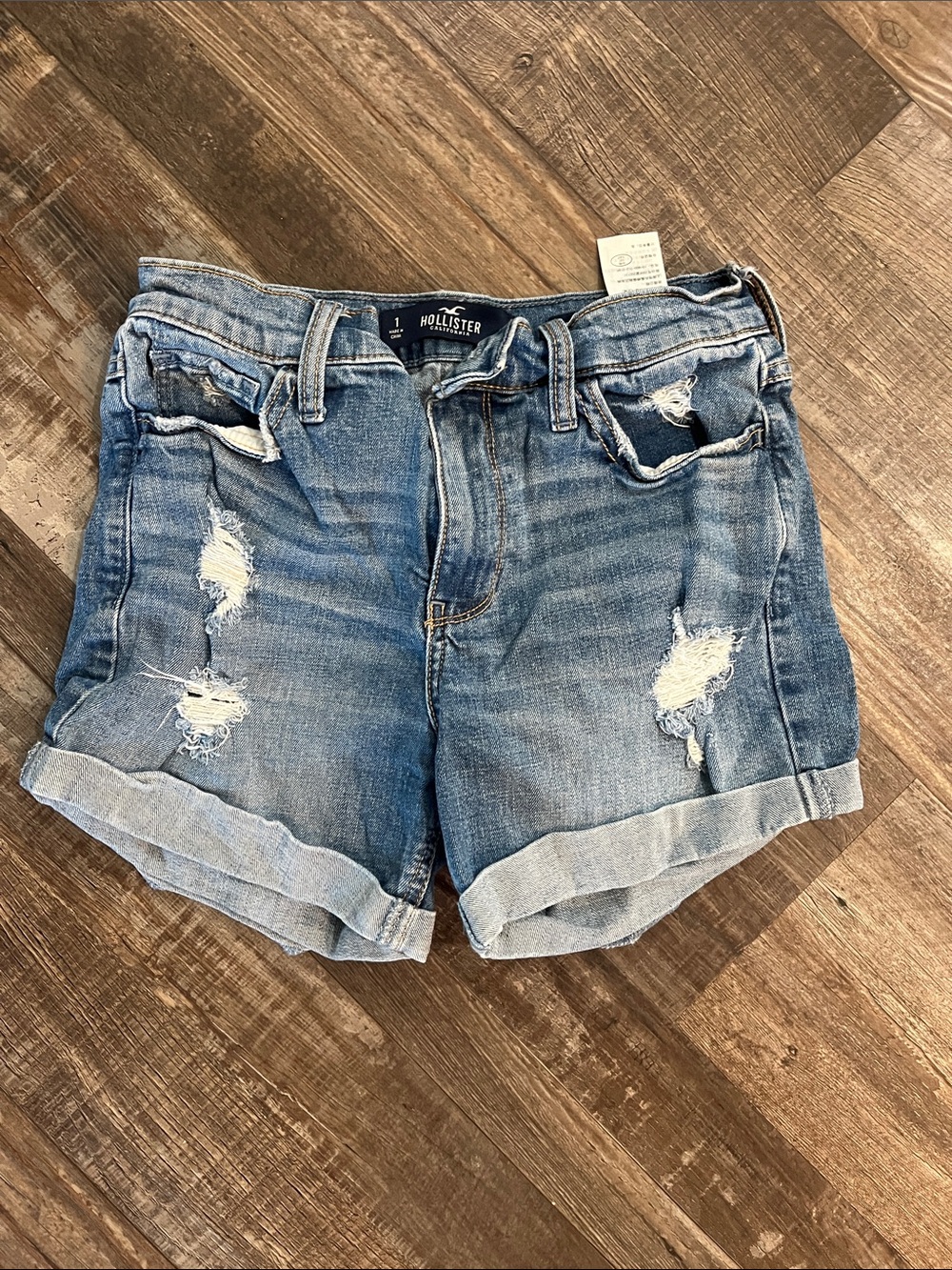 Hollister Distressed Roll-Cuff Denim Shorts in Light Blue Wash